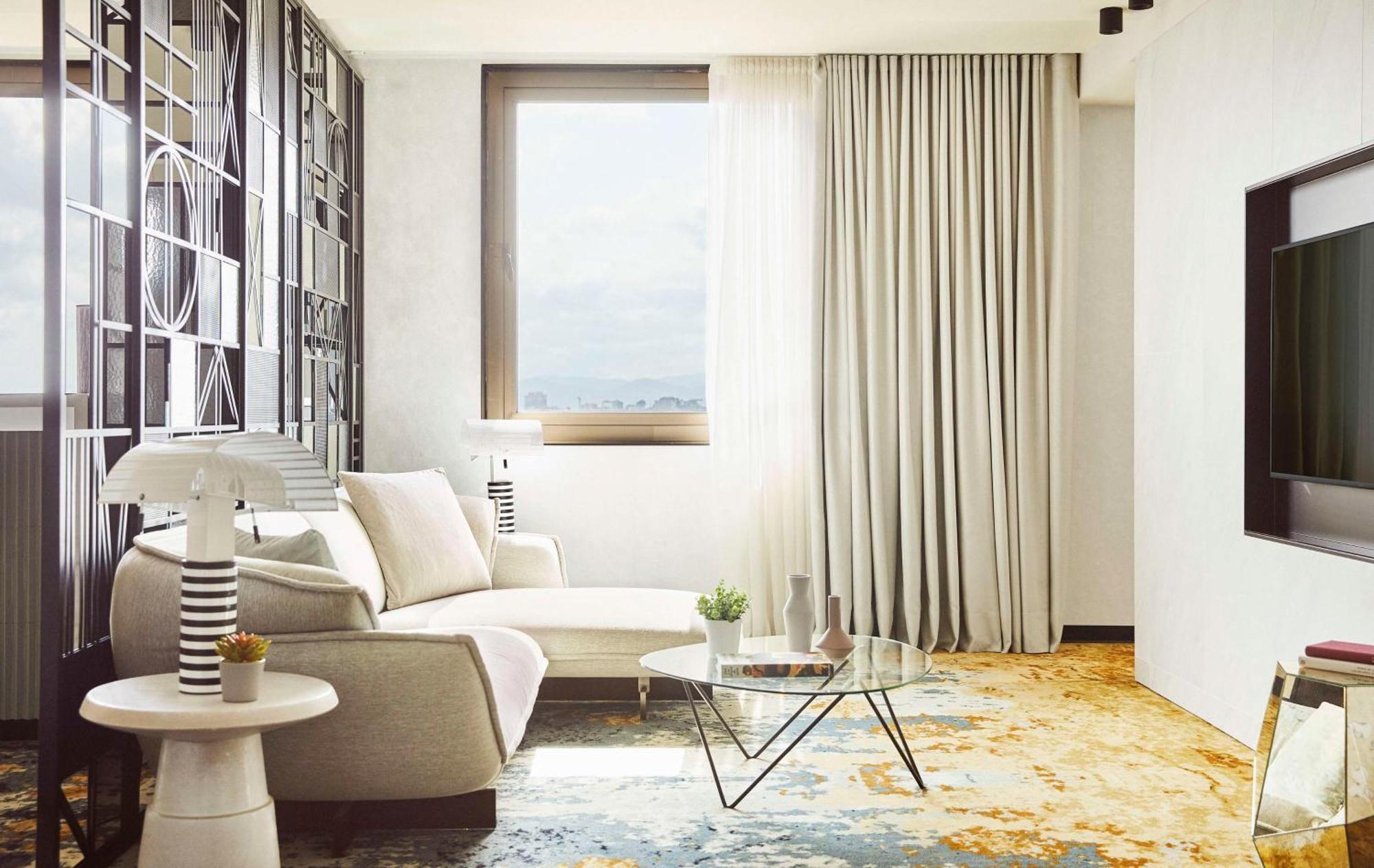 Hotel Grand Hyatt Barcelona Exteriér fotografie A living room with a carpet